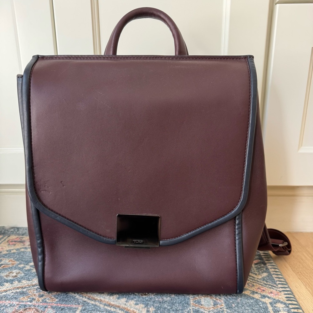 Tumi Genuine Leather dark purple luggage backpack